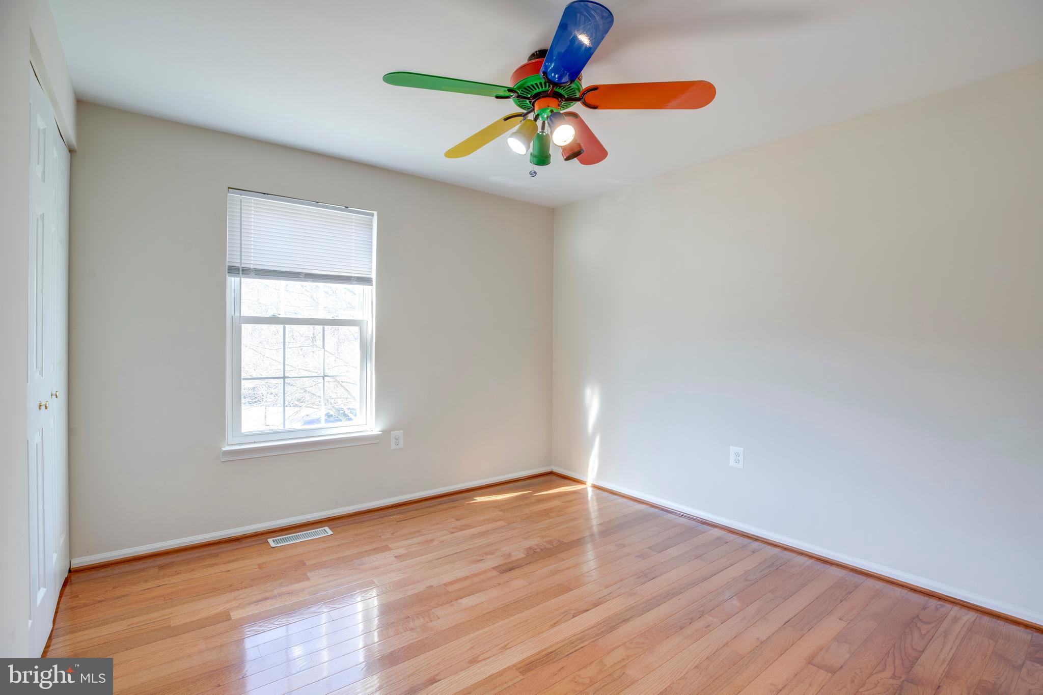 11905 Basswood Drive Laurel, MD 20708 - Photo 24 of 51 wooden floor in an empty room with a window