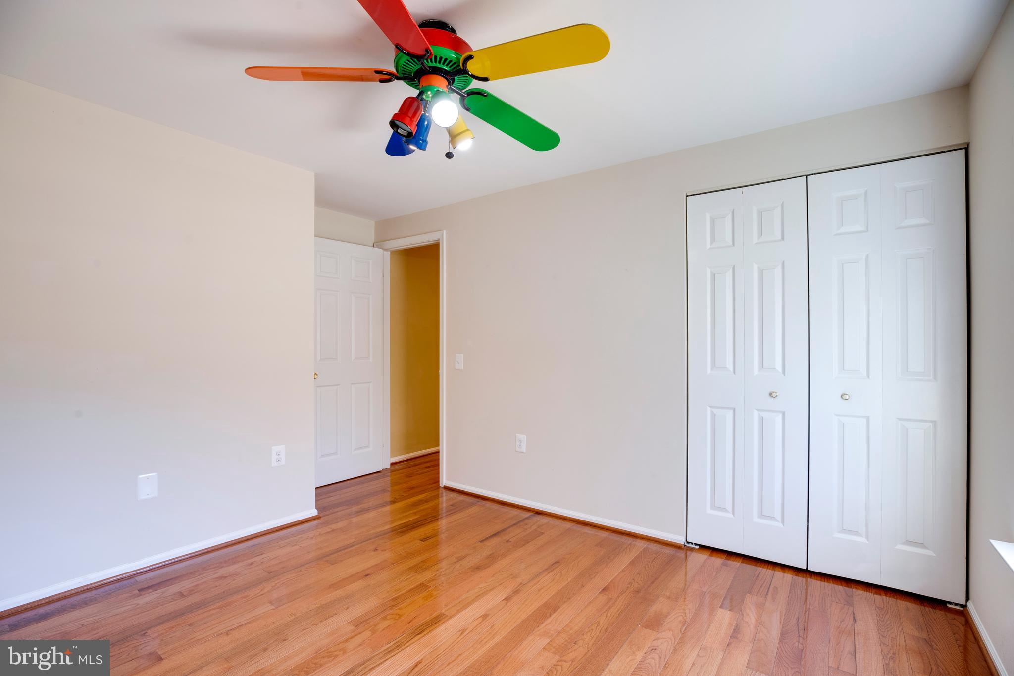 11905 Basswood Drive Laurel, MD 20708 - Photo 25 of 51 a view of an empty room with wooden floor
