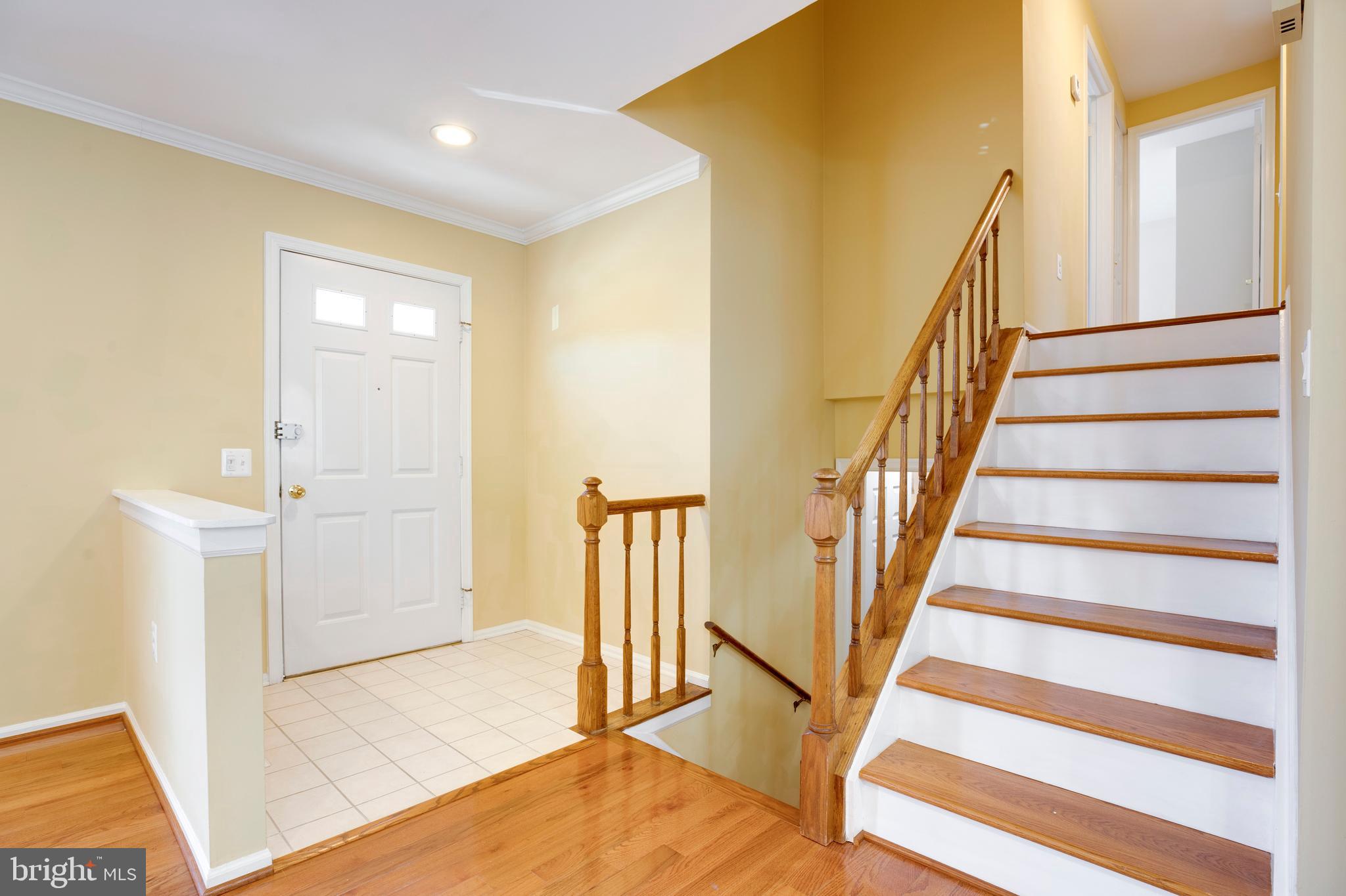 11905 Basswood Drive Laurel, MD 20708 - Photo 4 of 51 a view of entryway with wooden floor and door