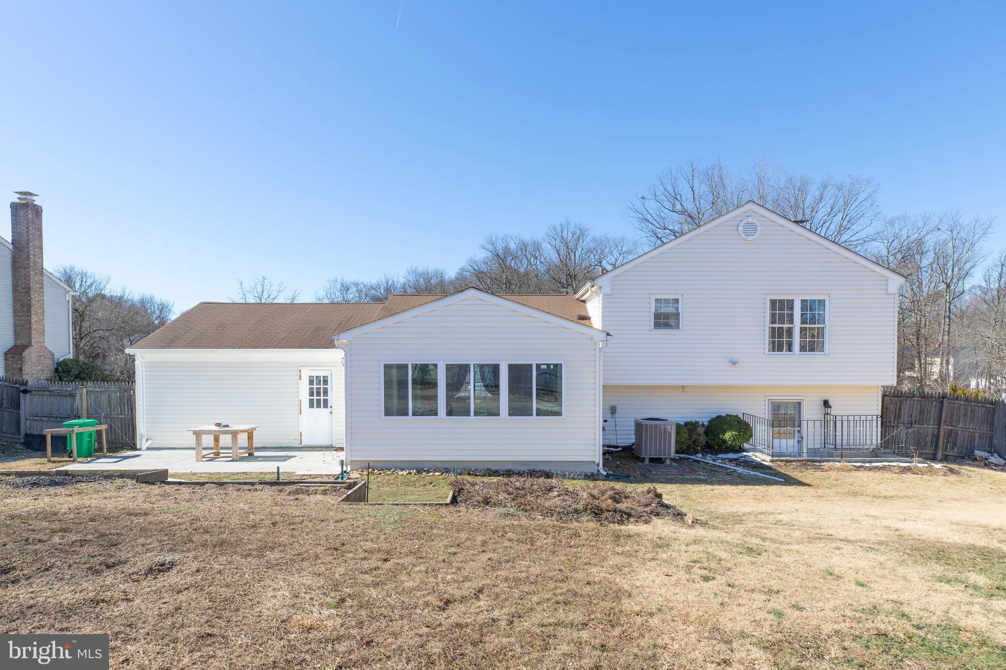 11905 Basswood Drive Laurel, MD 20708 - Photo 43 of 51 a front view of a house with a yard