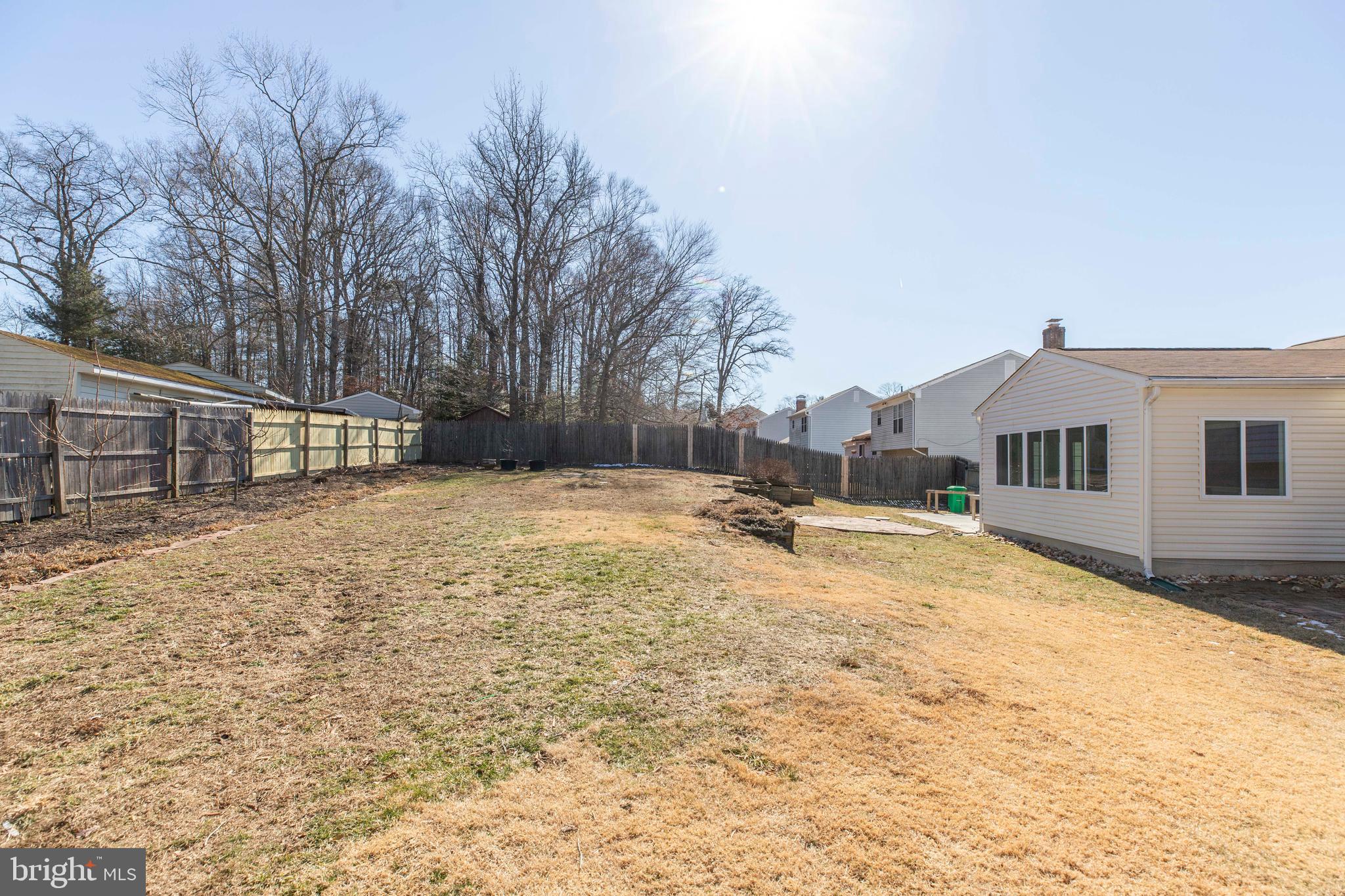 11905 Basswood Drive Laurel, MD 20708 - Photo 45 of 51 a house with trees in front of it