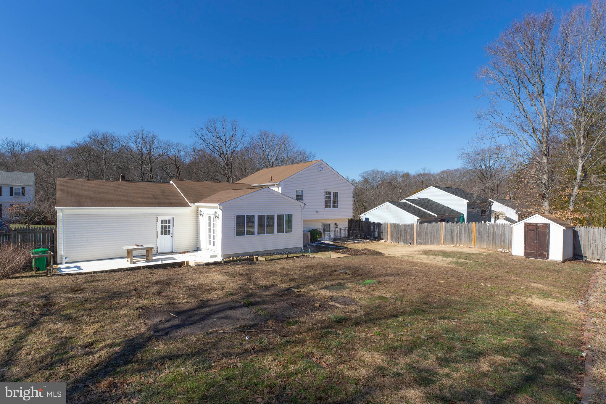 11905 Basswood Drive Laurel, MD 20708 - Photo 49 of 51 a front view of a house with a yard