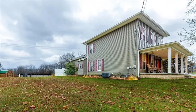 a front view of house with yard
