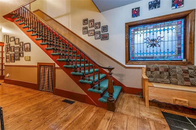 a view of entryway with wooden floor
