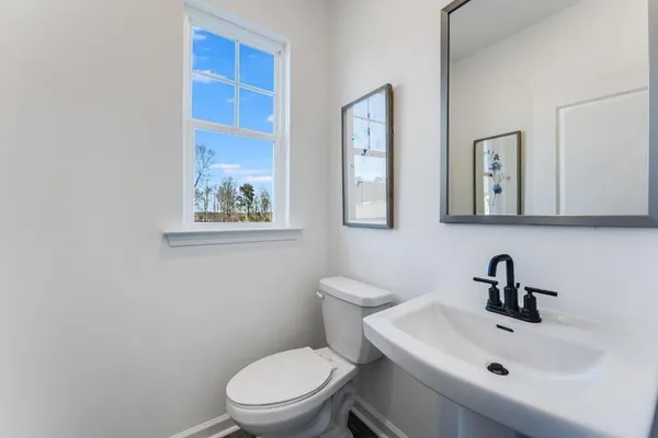 a spacious bedroom with a bed and a couch