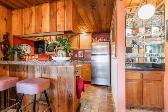 a view of dinning table and chairs in the balcony