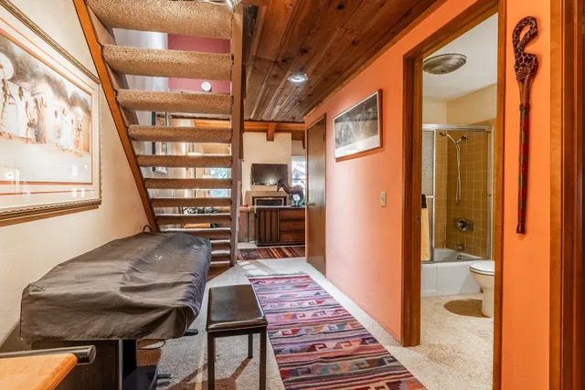 a view of front door with wooden floor