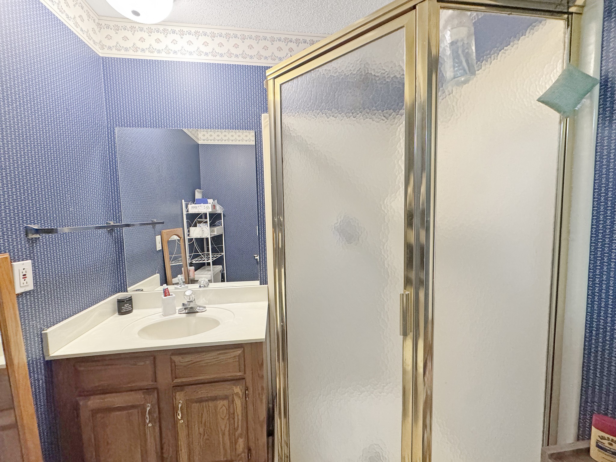 127 Lena Sykes Road Dover, TN 37058 - Photo 14 of 26 a bathroom with a sink and a mirror