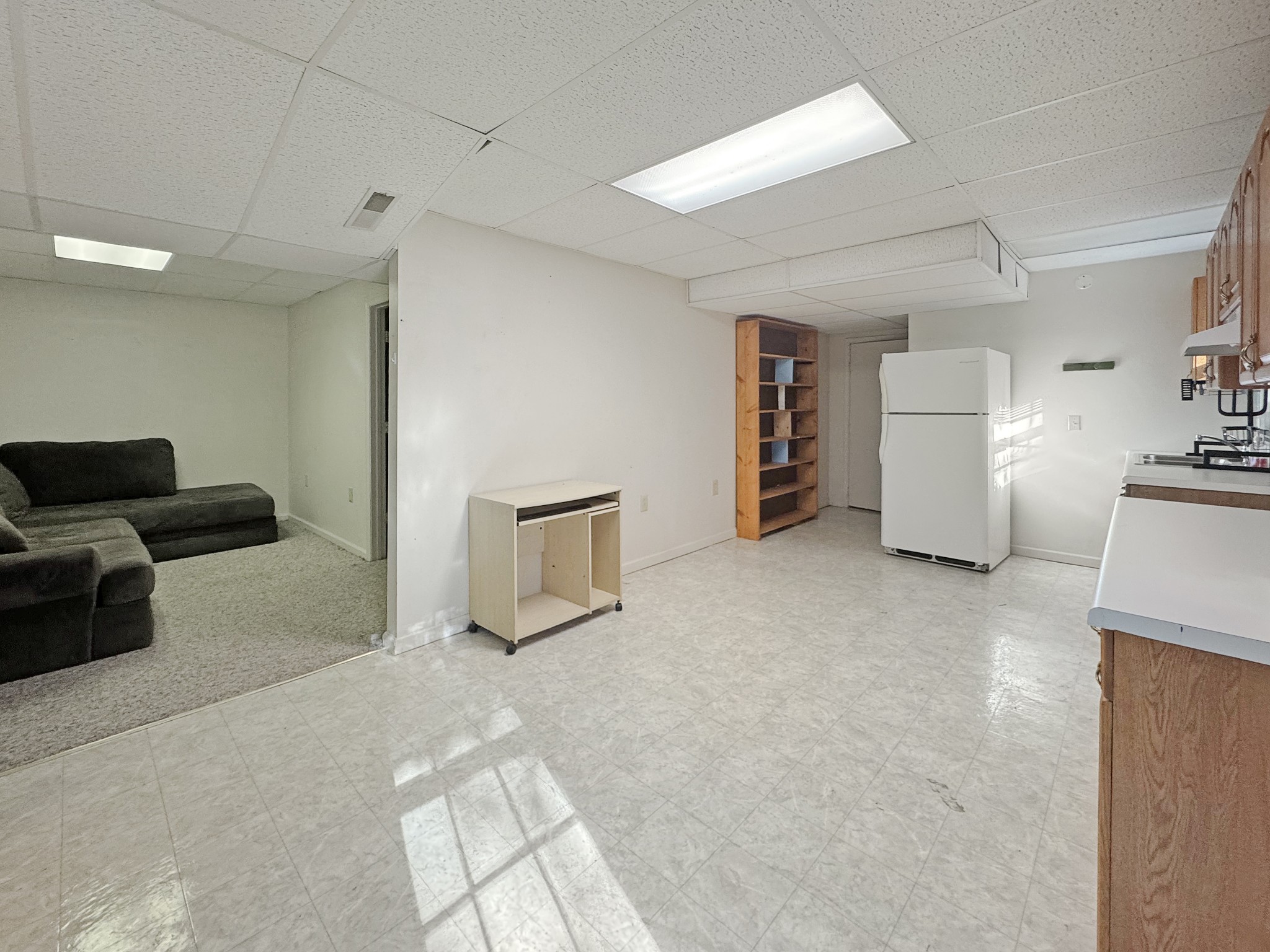 127 Lena Sykes Road Dover, TN 37058 - Photo 20 of 26 a view of livingroom with furniture and refrigerator