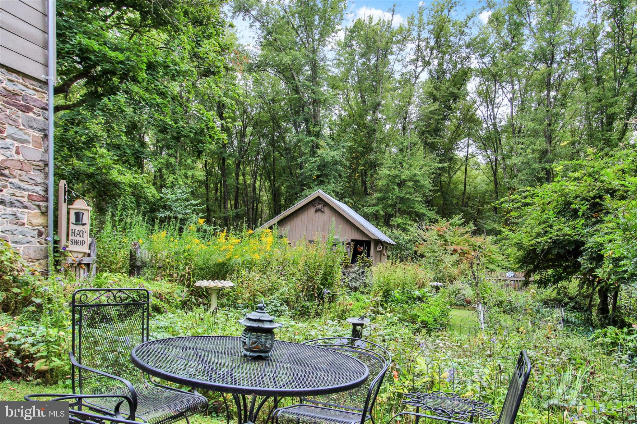 39 Kuhn Fording Road East Berlin, PA 17316 - Photo 13 of 71 a backyard of a house with table and chairs in a yard