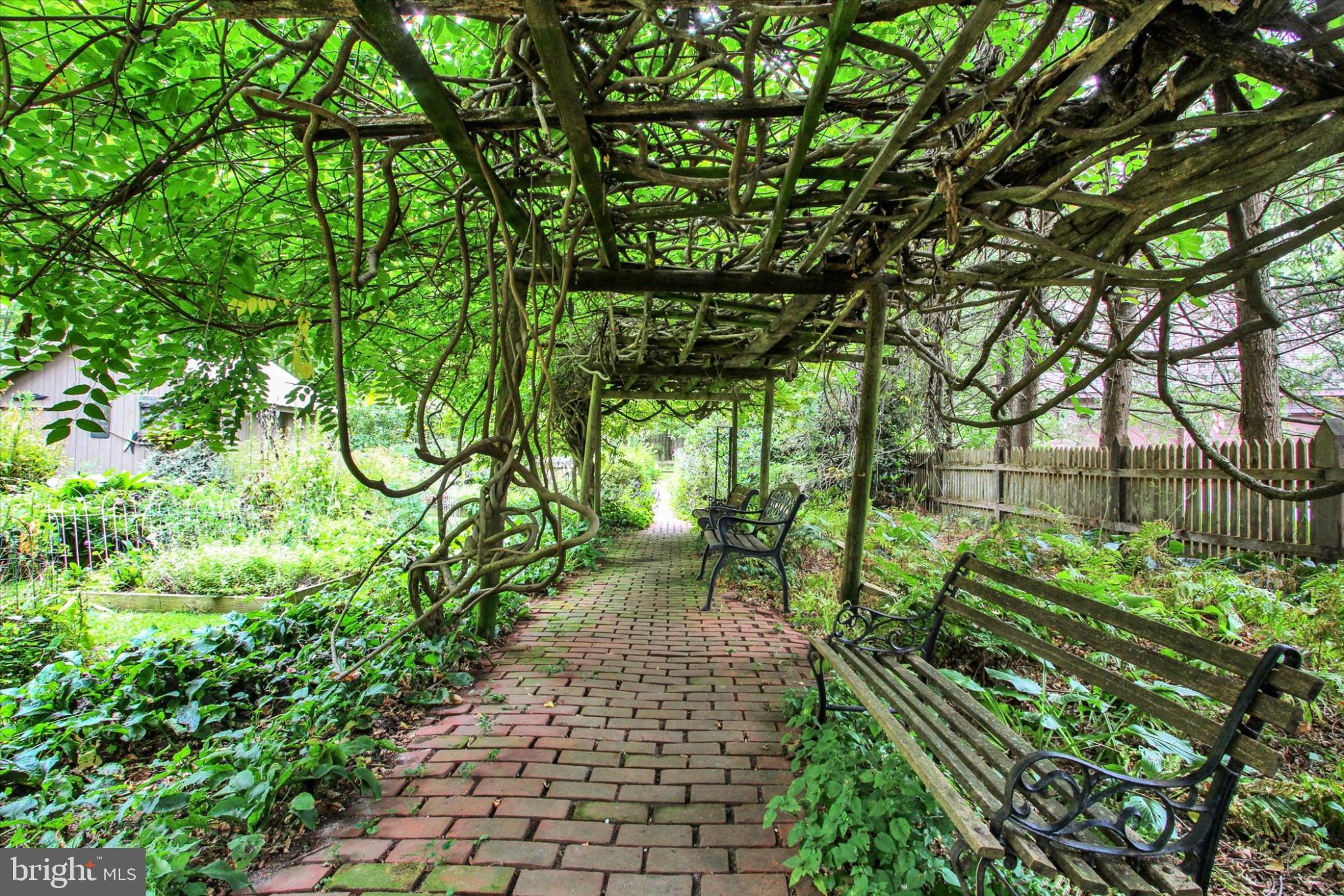 39 Kuhn Fording Road East Berlin, PA 17316 - Photo 15 of 71 Serene garden path beneath wisteria arbor
