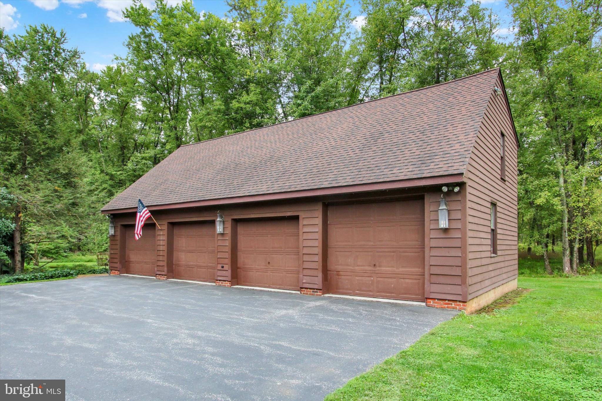 39 Kuhn Fording Road East Berlin, PA 17316 - Photo 16 of 71 a front view of a house with a yard and garage