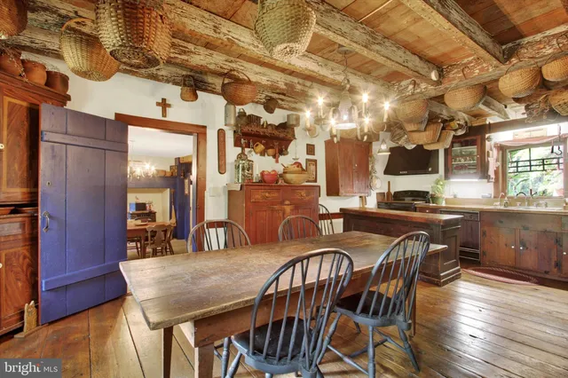 a view of a dining room with furniture and window