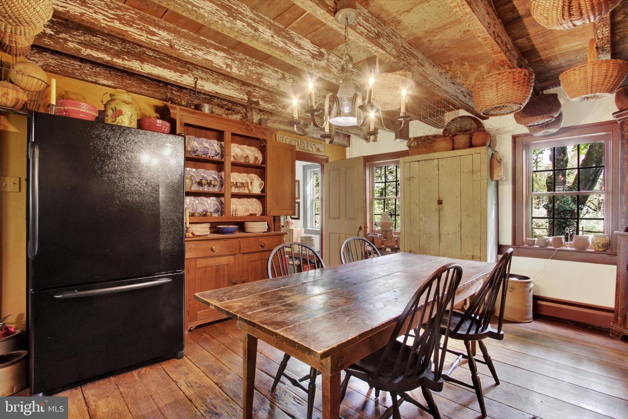 39 Kuhn Fording Road East Berlin, PA 17316 - Photo 32 of 71 a view of a dining room with furniture window and wooden floor
