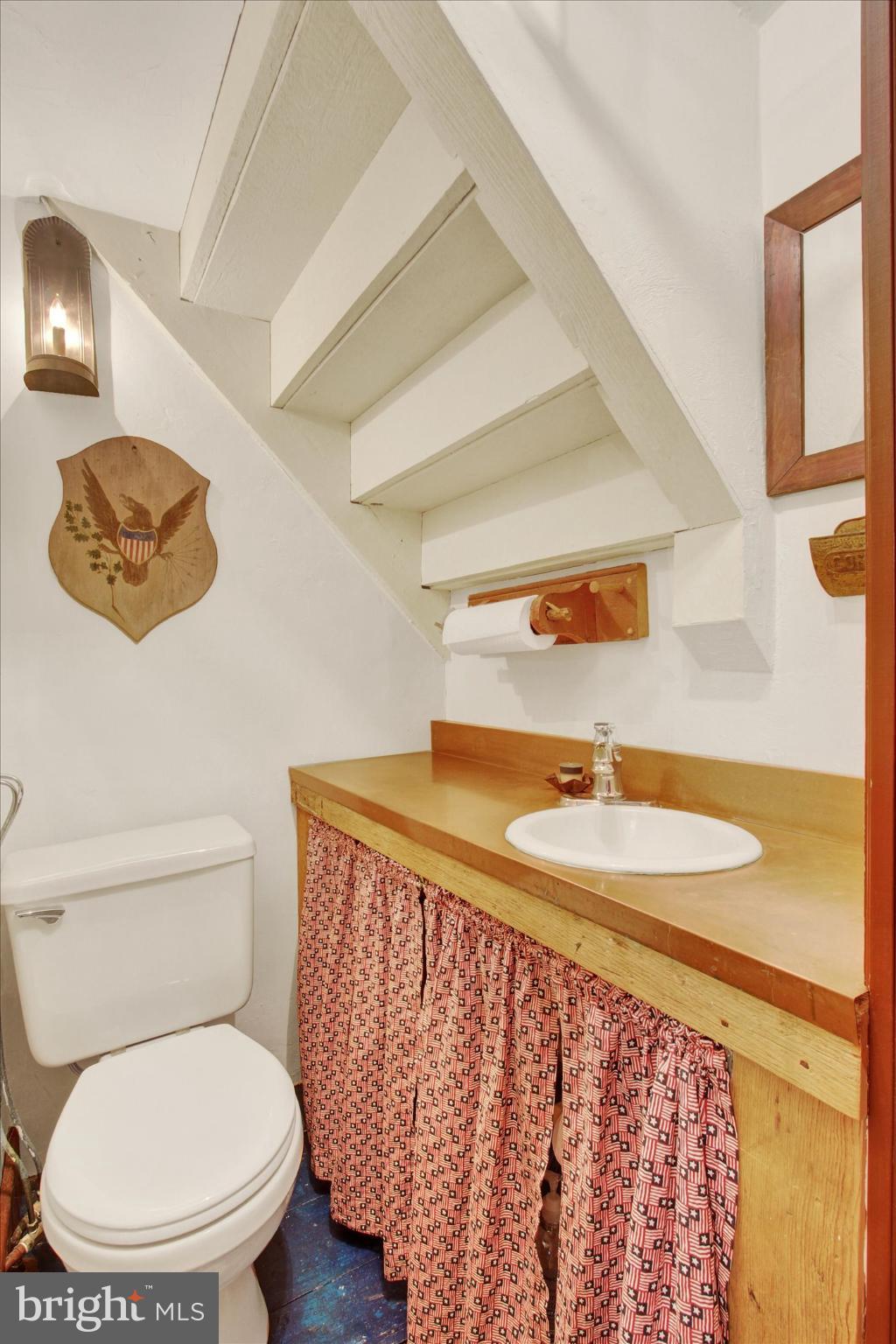 39 Kuhn Fording Road East Berlin, PA 17316 - Photo 43 of 71 a bathroom with a toilet sink and mirror