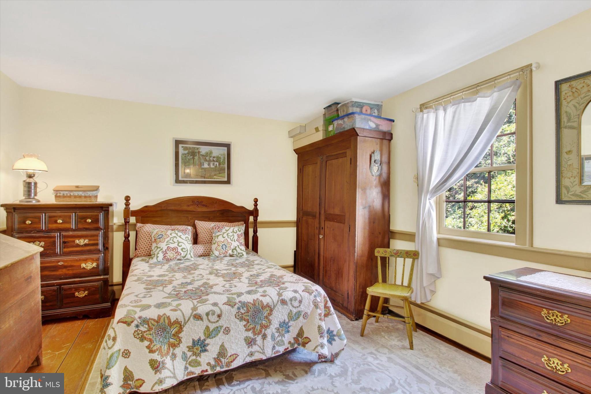 39 Kuhn Fording Road East Berlin, PA 17316 - Photo 49 of 71 a bedroom with a large bed and a window
