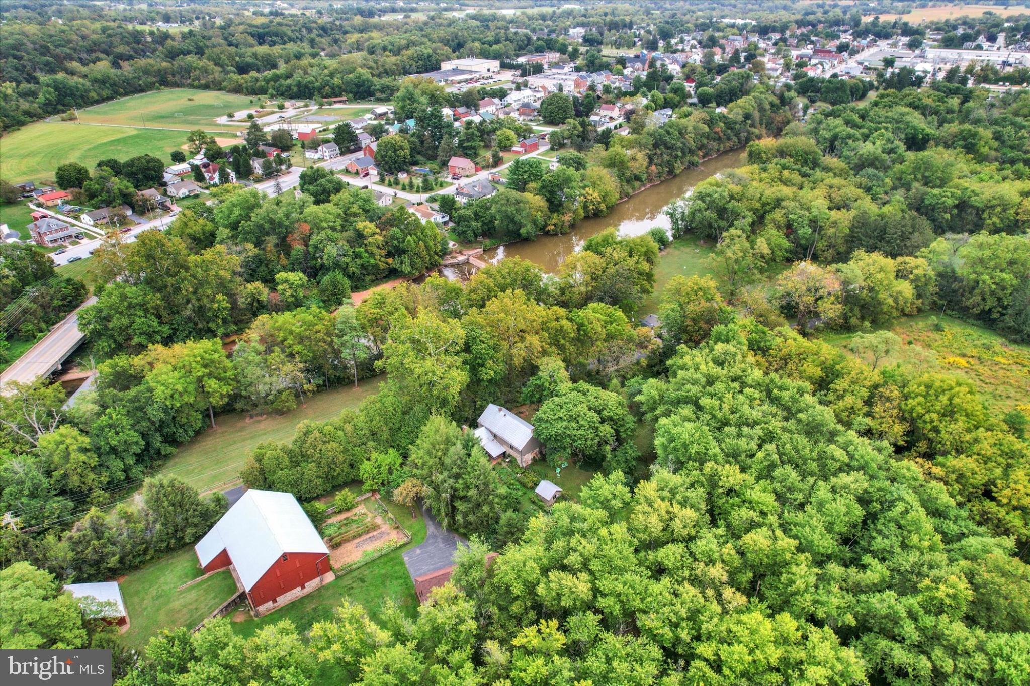 39 Kuhn Fording Road East Berlin, PA 17316 - Photo 65 of 71 an aerial view of a house with a yard and greenery