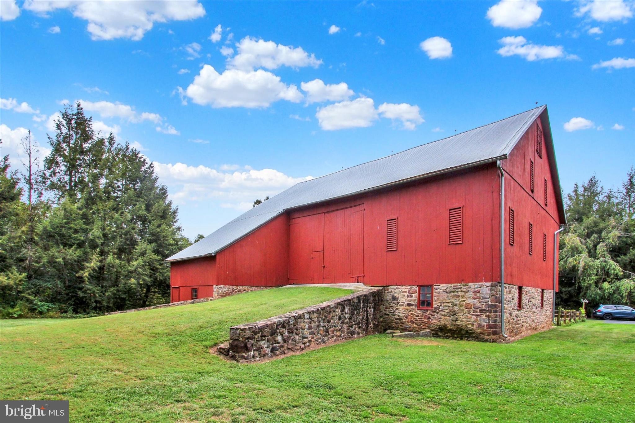39 Kuhn Fording Road East Berlin, PA 17316 - Photo 7 of 71 a view of a backyard with plants and large trees