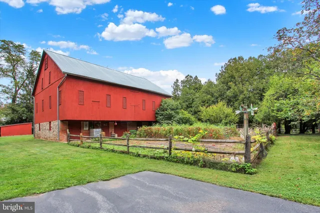 a house with trees in the background