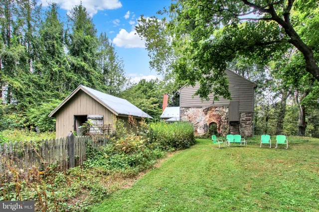 a view of outdoor space with table and chairs