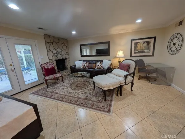 a living room with furniture and a table
