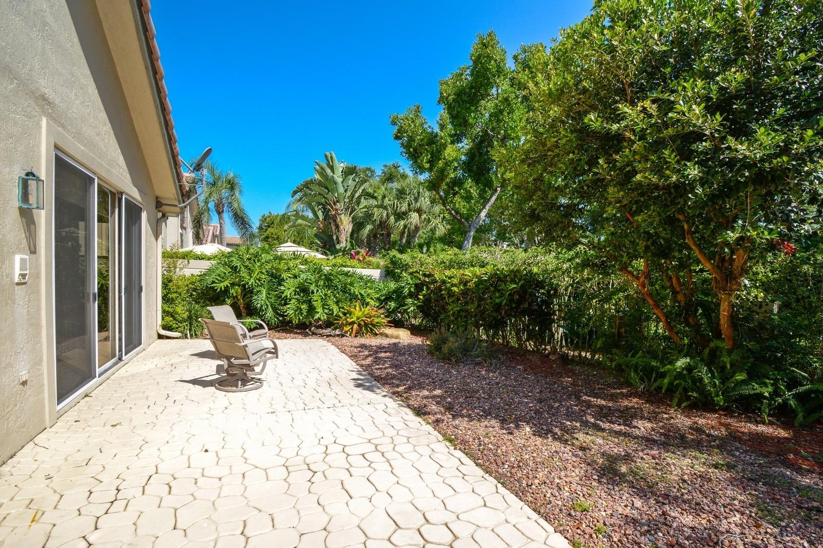 5342 Northwest 26th Circle Boca Raton, FL 33496 - Photo 16 of 20 12_5342NW26thCircle_26_BackYard_Custom_R