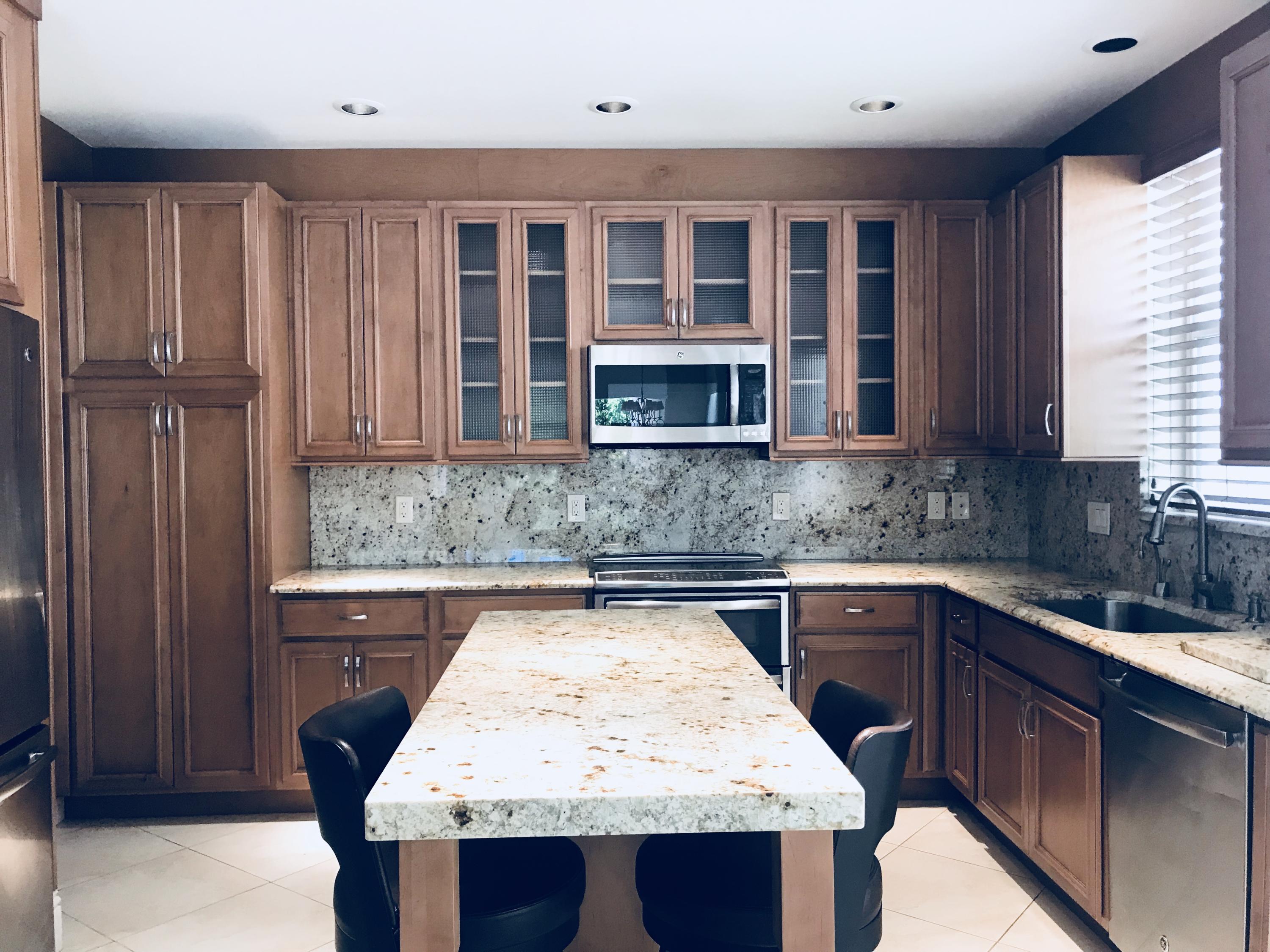 5342 Northwest 26th Circle Boca Raton, FL 33496 - Photo 3 of 20 MARBLE COUNTER TOPS