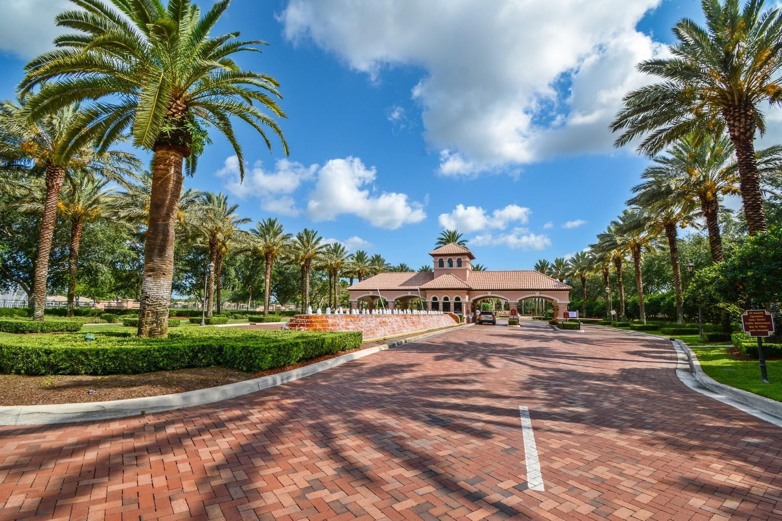 5342 Northwest 26th Circle Boca Raton, FL 33496 - Photo 6 of 20 02_5342NW26thCircle_301_Entrance_Custom_