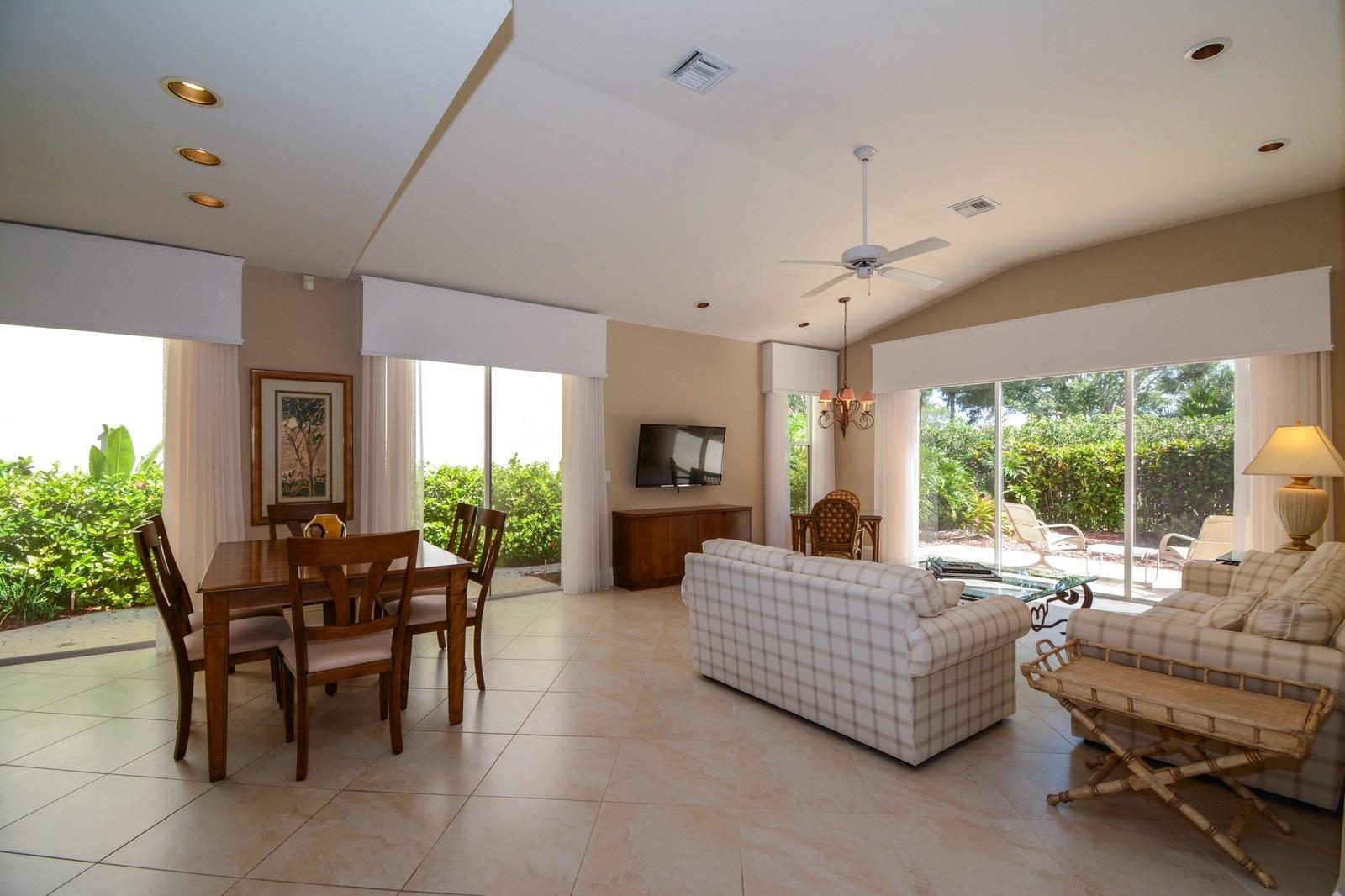 5342 Northwest 26th Circle Boca Raton, FL 33496 - Photo 7 of 20 03_5342NW26thCircle_93_LivingRoomDiningR