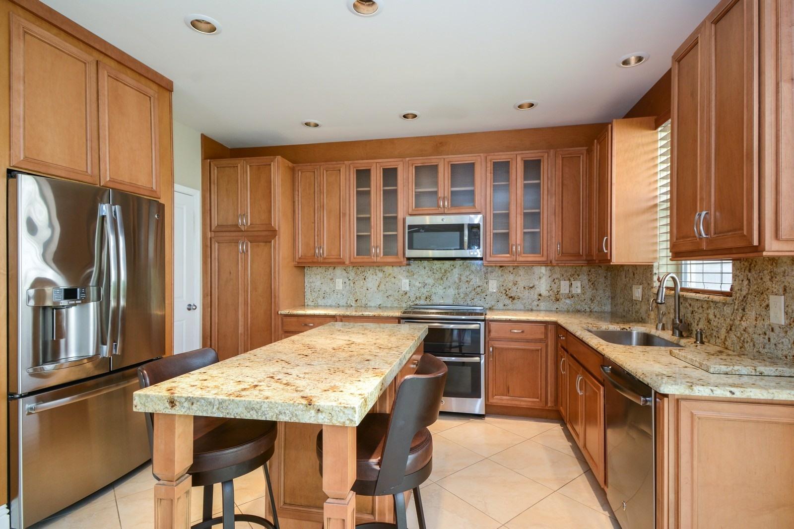 5342 Northwest 26th Circle Boca Raton, FL 33496 - Photo 8 of 20 04_5342NW26thCircle_5_Kitchen_Custom_Res