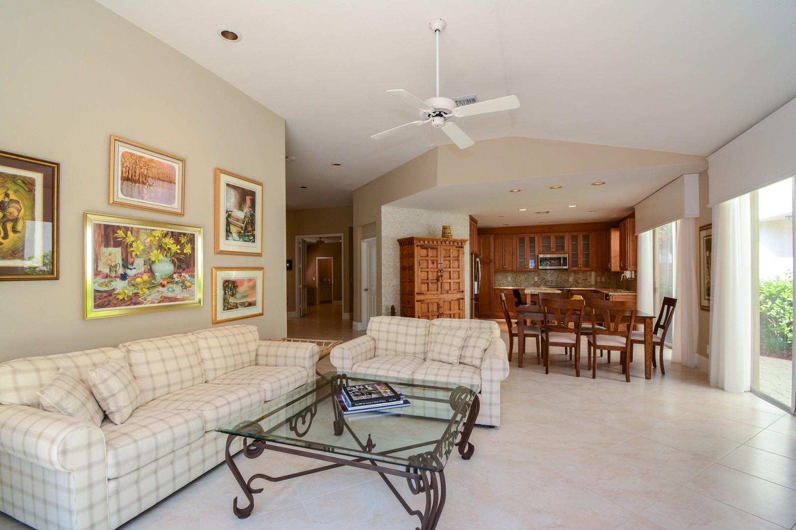 5342 Northwest 26th Circle Boca Raton, FL 33496 - Photo 9 of 20 05_5342NW26thCircle_91_KitchenLivingRoom