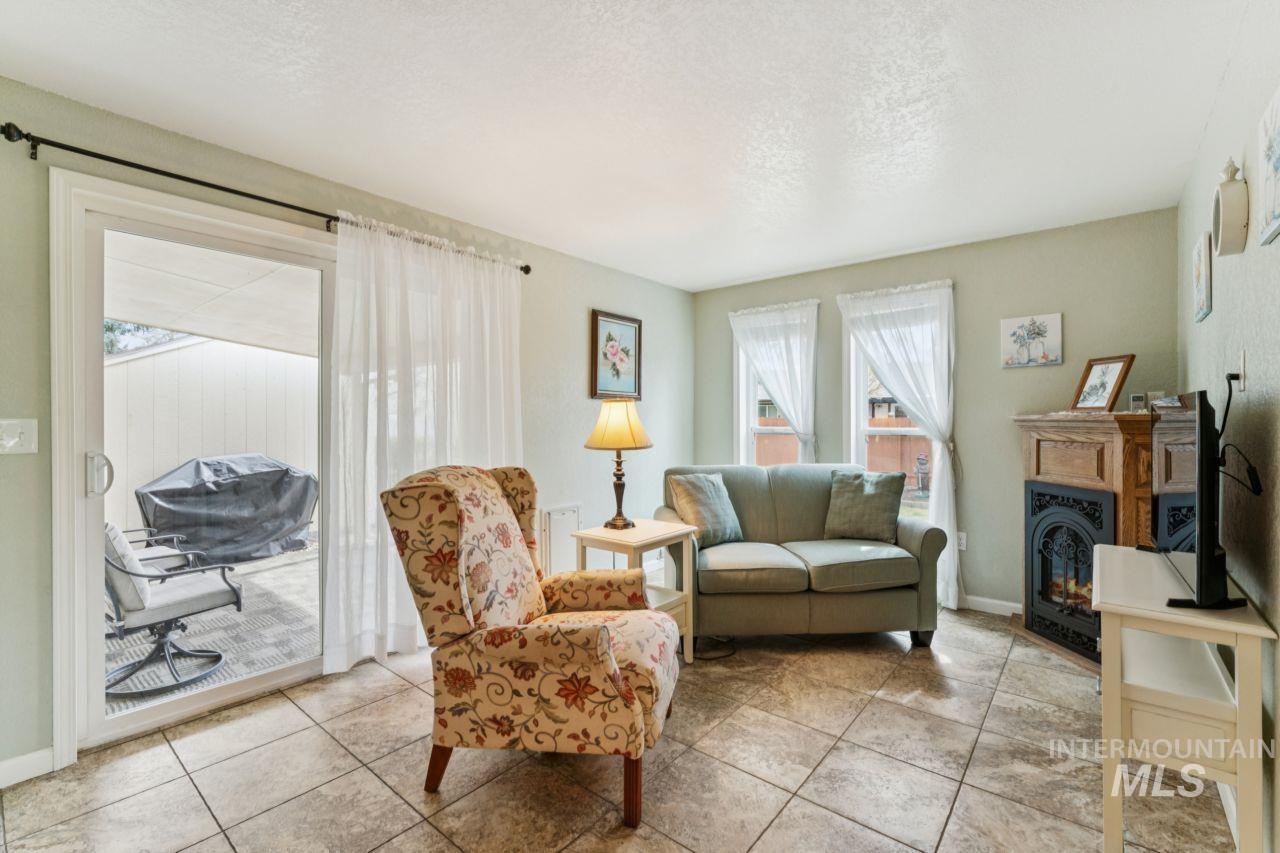 4093 North Marylebone Way Boise, ID 83713 - Photo 17 of 48 Sitting room with a textured ceiling and light tile patterned floors