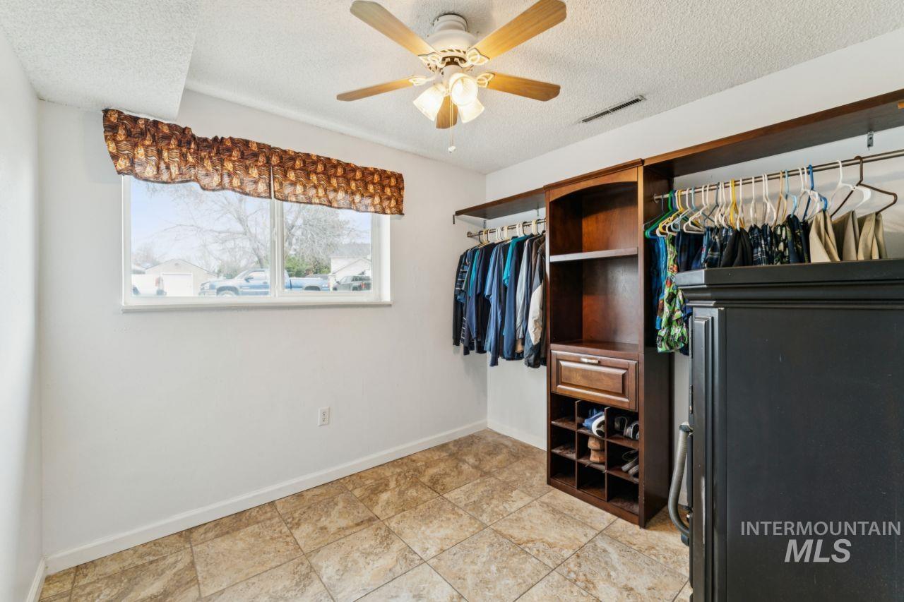 4093 North Marylebone Way Boise, ID 83713 - Photo 28 of 48 Walk in closet with a ceiling fan