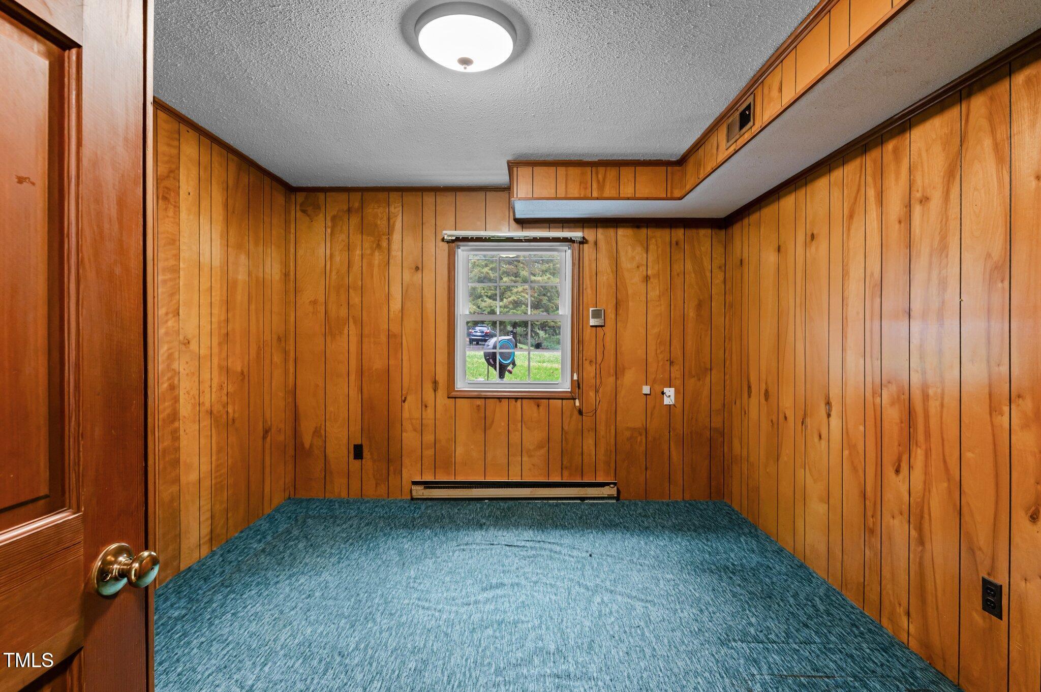505 Forest Road Oxford, NC 27565 - Photo 18 of 31 a view of an empty room and window