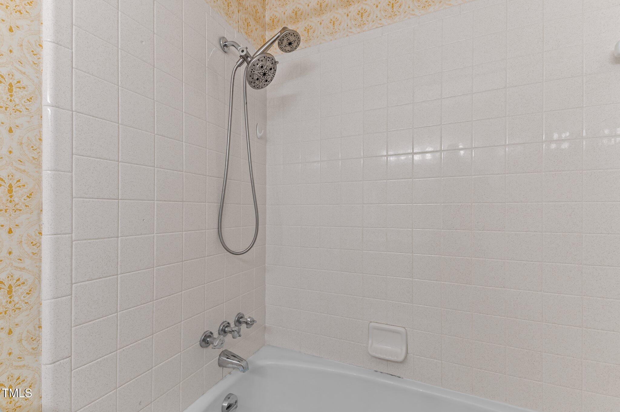 505 Forest Road Oxford, NC 27565 - Photo 20 of 31 a bathroom with a bath tub with a shower