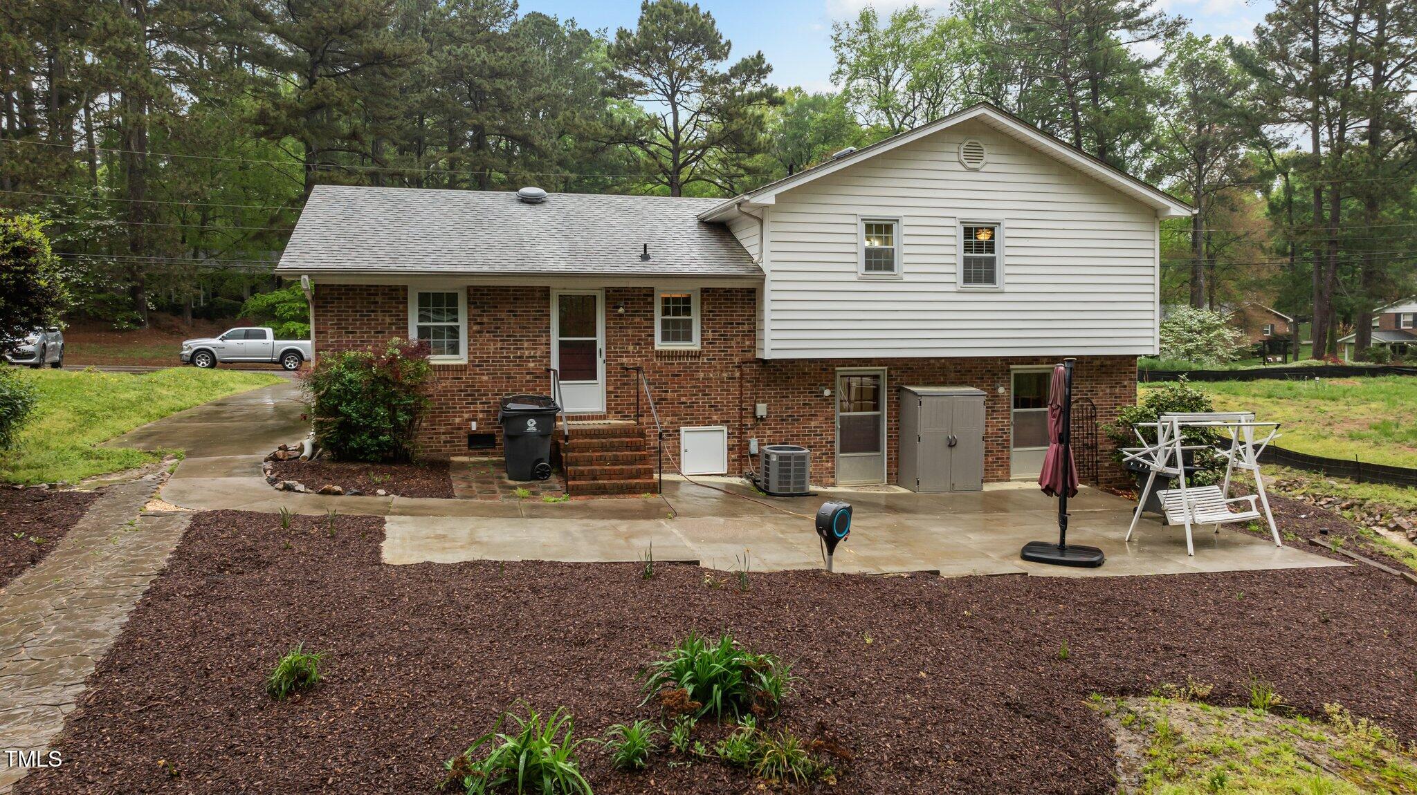 505 Forest Road Oxford, NC 27565 - Photo 21 of 31 a front view of a house with garden