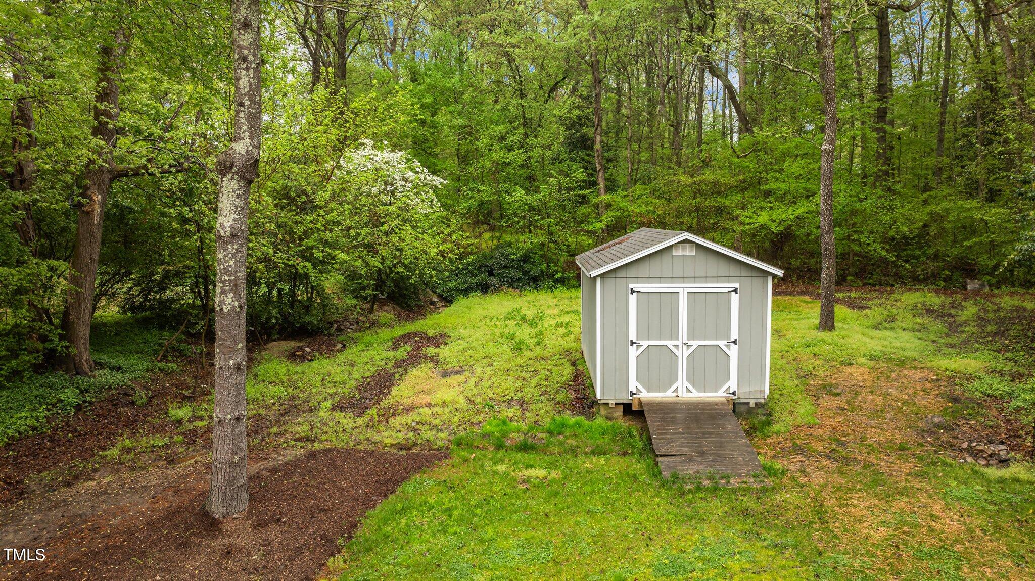 505 Forest Road Oxford, NC 27565 - Photo 23 of 31 a front view of a house with garden
