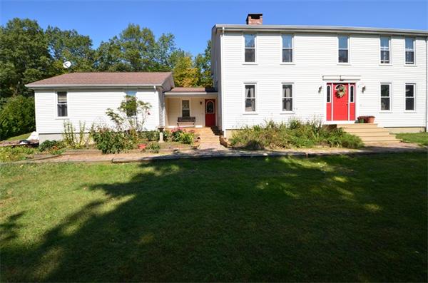 64 North Sturbridge Road Charlton, MA 01507 - Photo 1 of 30 a front view of house with yard and green space