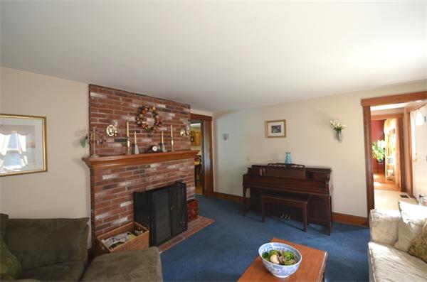 64 North Sturbridge Road Charlton, MA 01507 - Photo 11 of 30 a living room with furniture and a fireplace