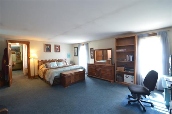 64 North Sturbridge Road Charlton, MA 01507 - Photo 15 of 30 a bedroom with a bed and furniture