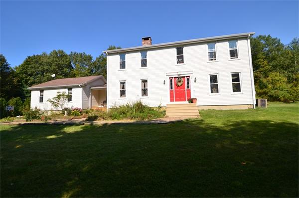 64 North Sturbridge Road Charlton, MA 01507 - Photo 2 of 30 a front view of a house with a yard
