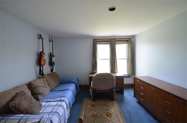 64 North Sturbridge Road Charlton, MA 01507 - Photo 22 of 30 a living room with furniture and a window