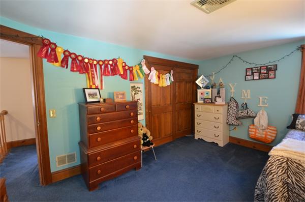 64 North Sturbridge Road Charlton, MA 01507 - Photo 23 of 30 a bedroom with a bed and a closet