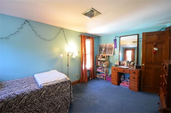 64 North Sturbridge Road Charlton, MA 01507 - Photo 24 of 30 a bedroom with a bed and furniture