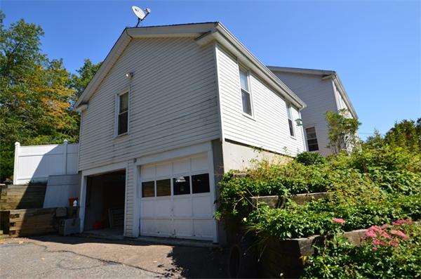64 North Sturbridge Road Charlton, MA 01507 - Photo 28 of 30 a front view of a house with a garden