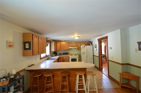 64 North Sturbridge Road Charlton, MA 01507 - Photo 5 of 30 a kitchen with a sink appliances and a window