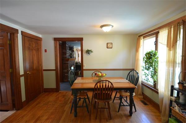 64 North Sturbridge Road Charlton, MA 01507 - Photo 8 of 30 a view of a dining room with furniture window and wooden floor