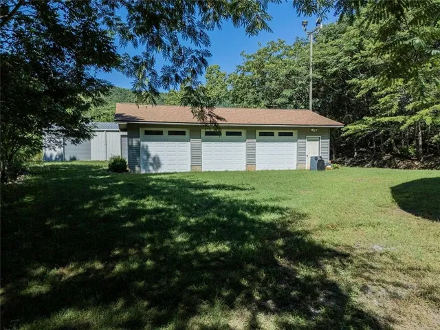 a house view with a garden space