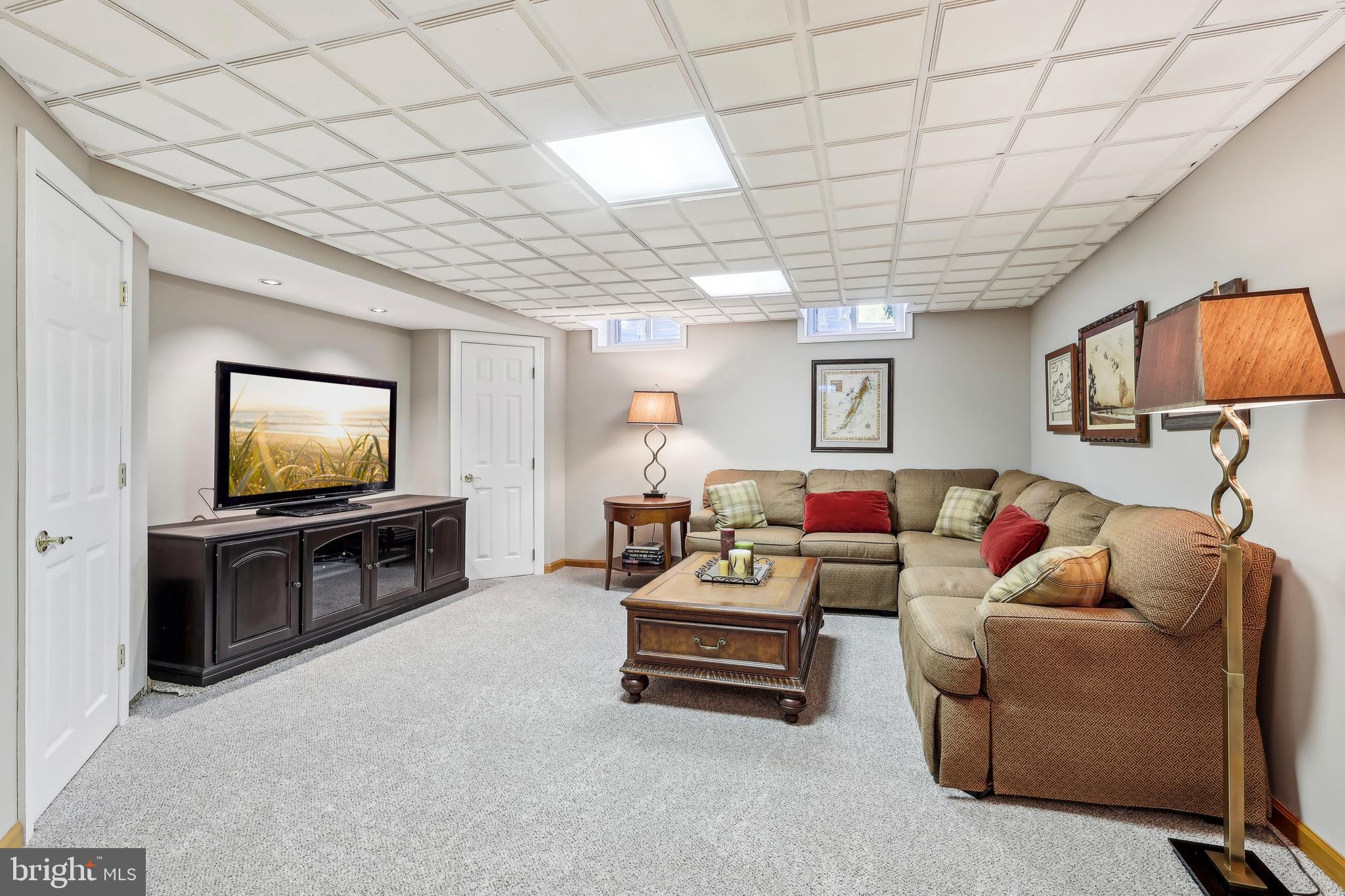 3 Eagleton Farm Road Newtown, PA 18940 - Photo 24 of 40 a living room with furniture and a flat screen tv