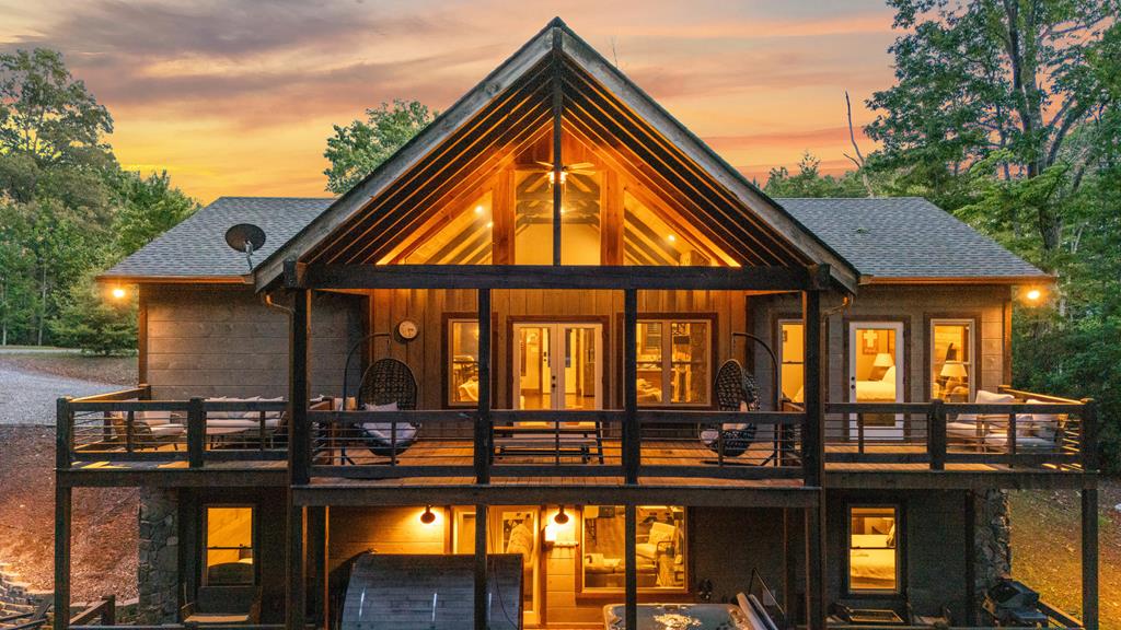 a view of swimming pool with outdoor seating